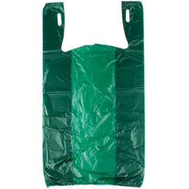 Les sacs d'épicerie de couleur verte, tee-shirt en plastique met en sac favorable à l'environnement